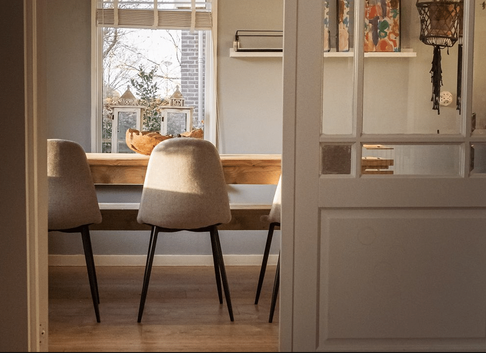 Modern kitchen with electric underfloor heating installed beneath tiled flooring